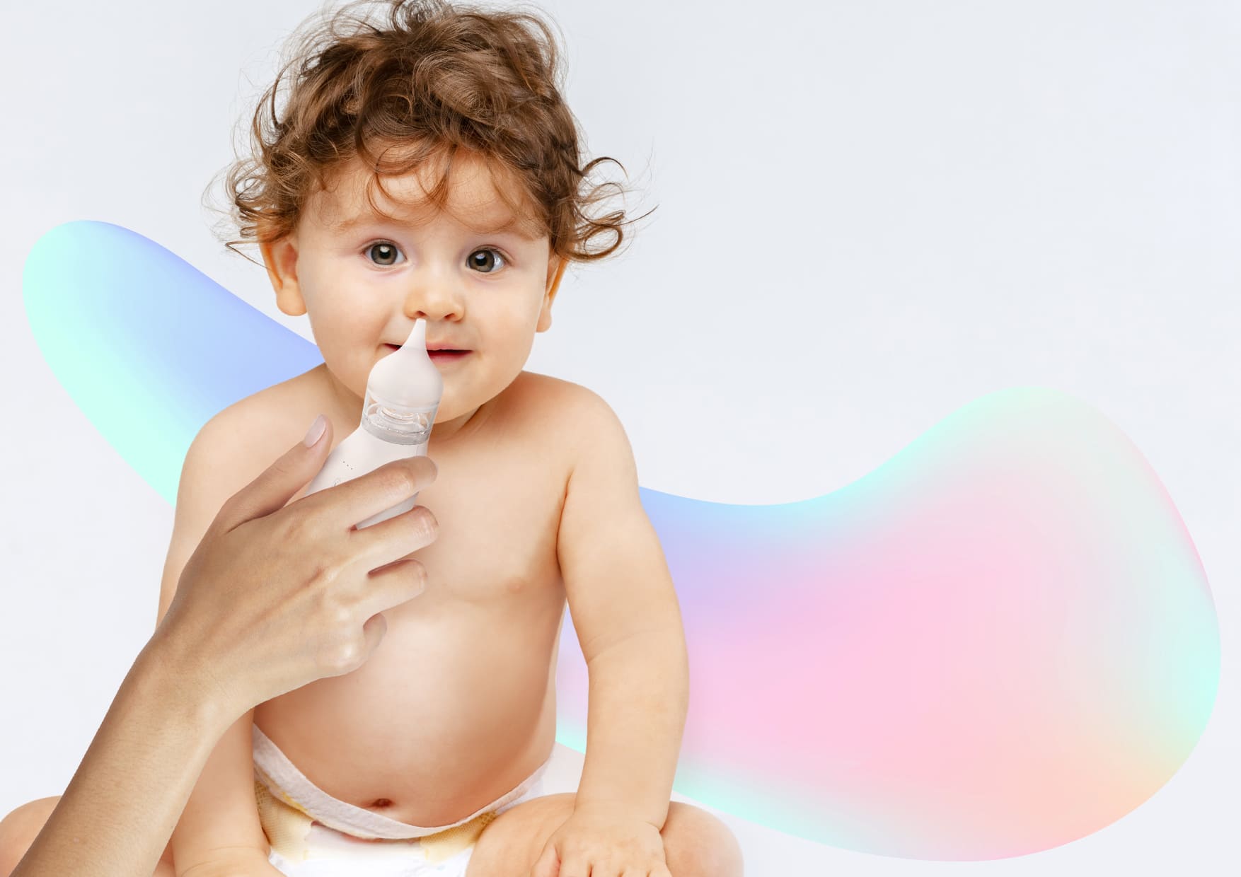 ręka ktora przesuwa aspirator do wtarzy dziecka