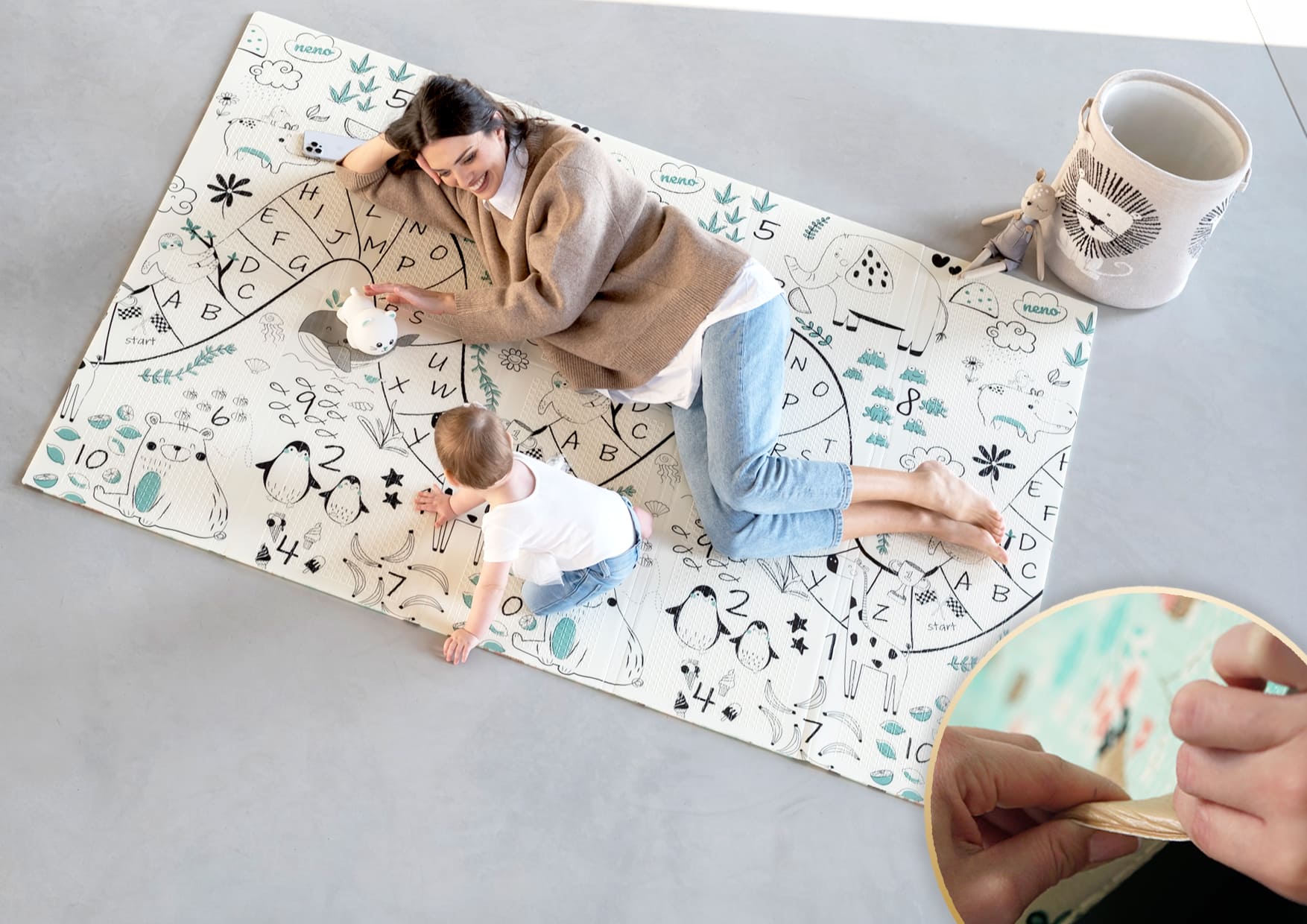 woman with child lying on foam mat